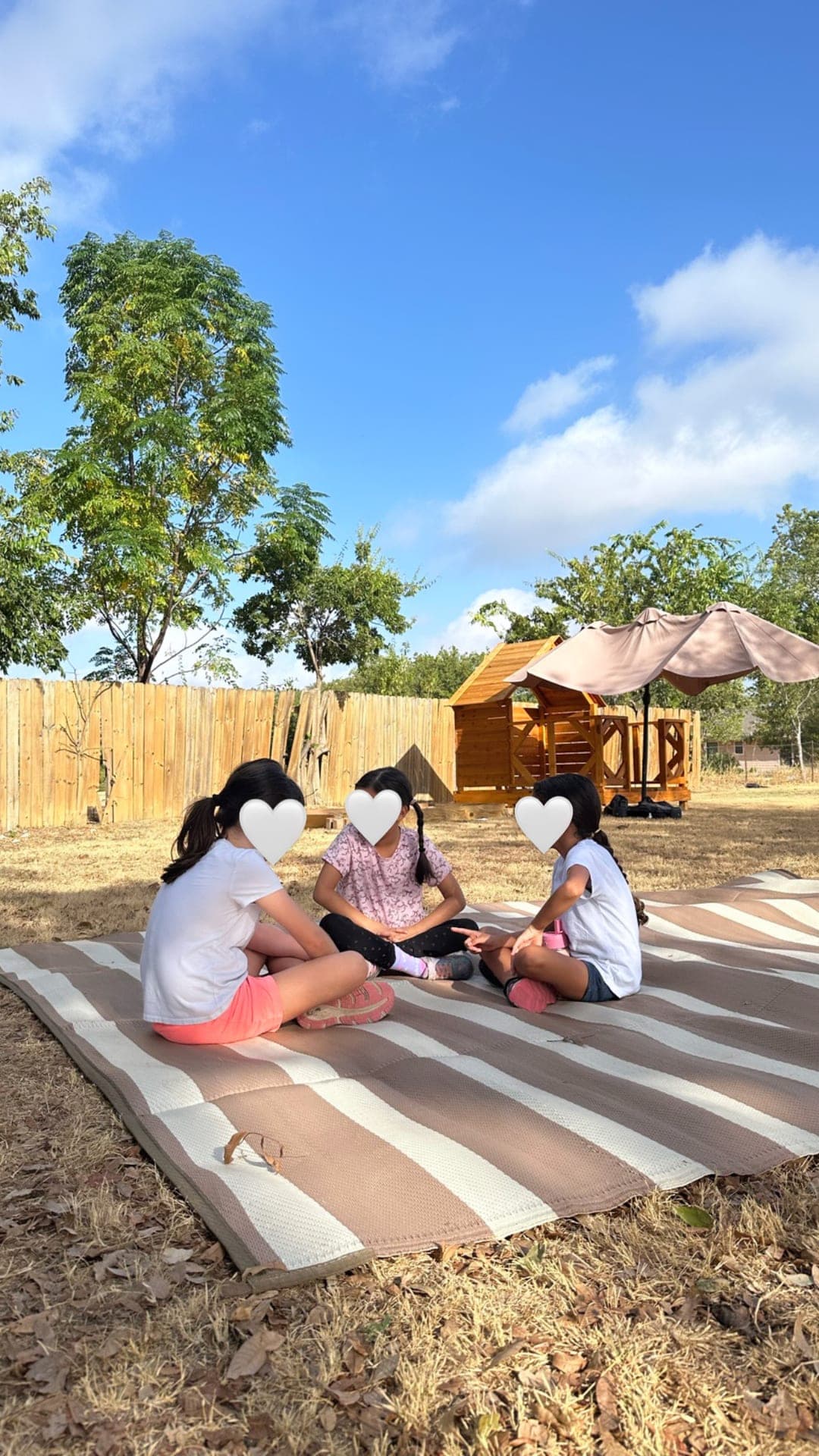 Outdoor community circle on the striped mat