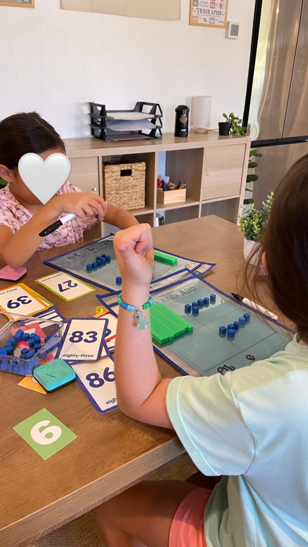 Addition practice with base-ten blocks and build-and-add mats