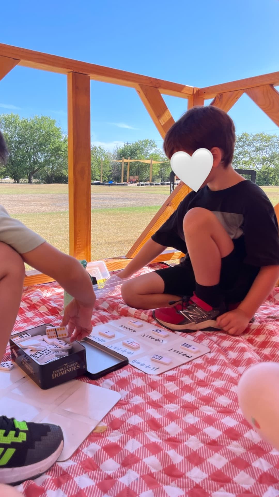 Domino addition under the porch — hands-on math in the sunshine