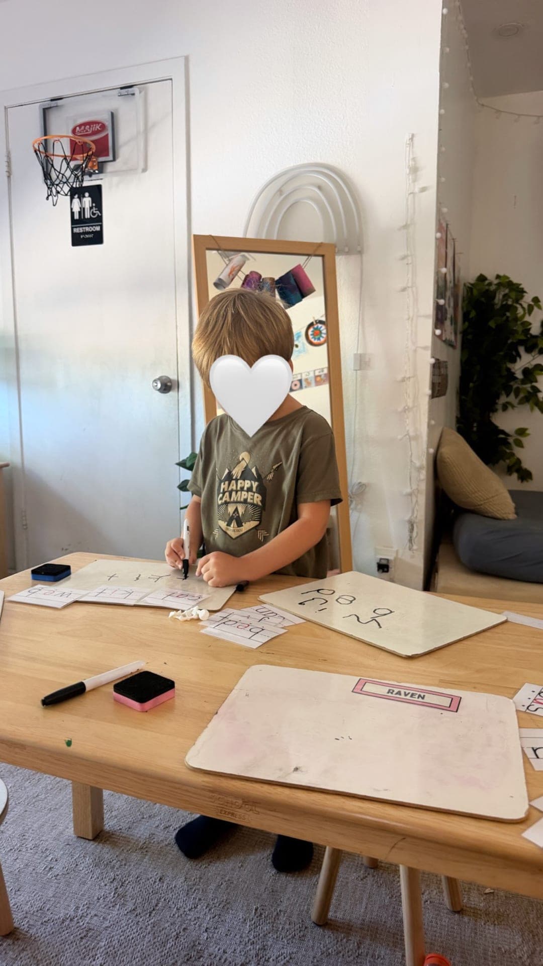 CVC word practice on whiteboards with flashcards