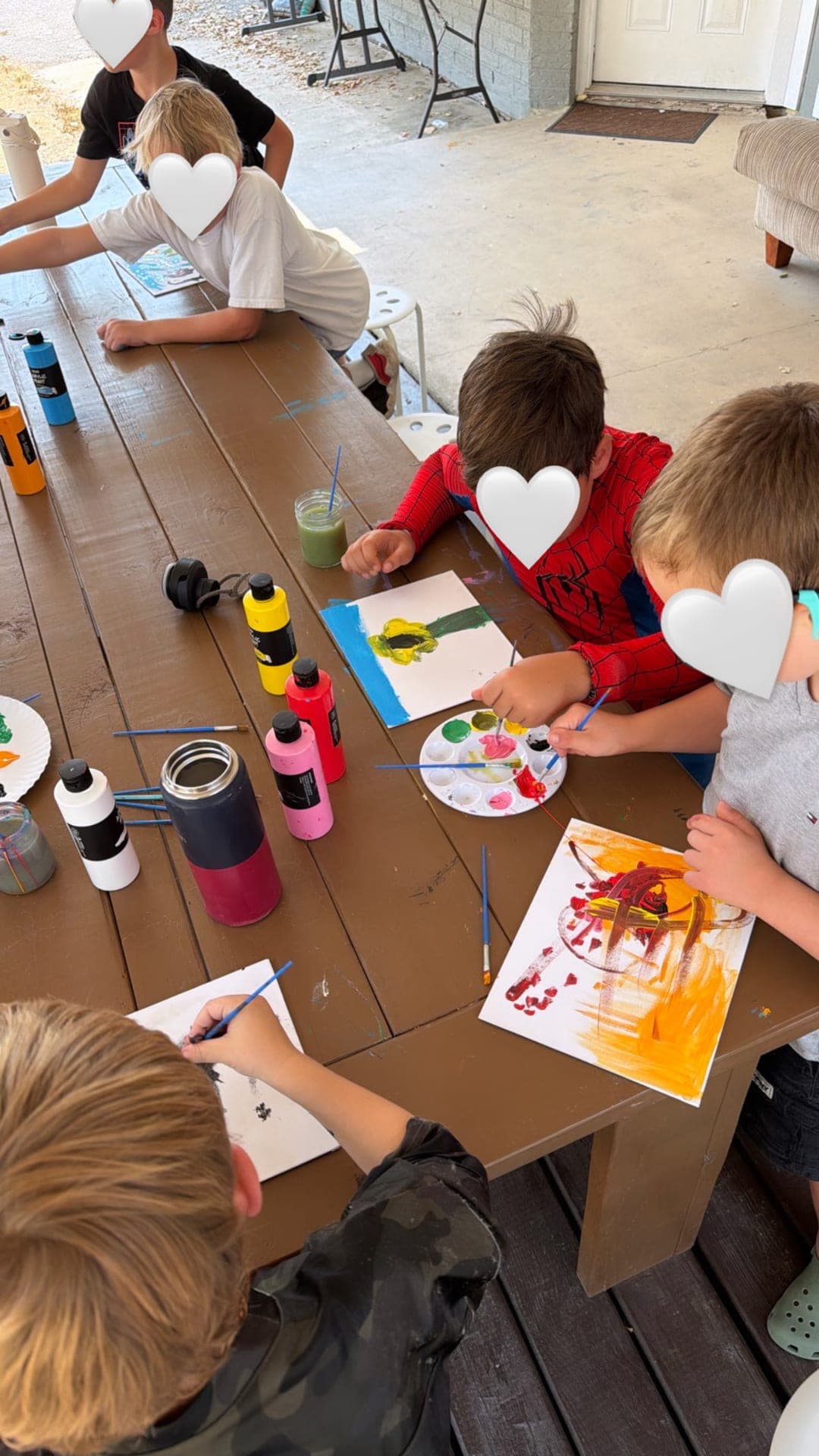 Garden-inspired canvas painting on the outdoor art table