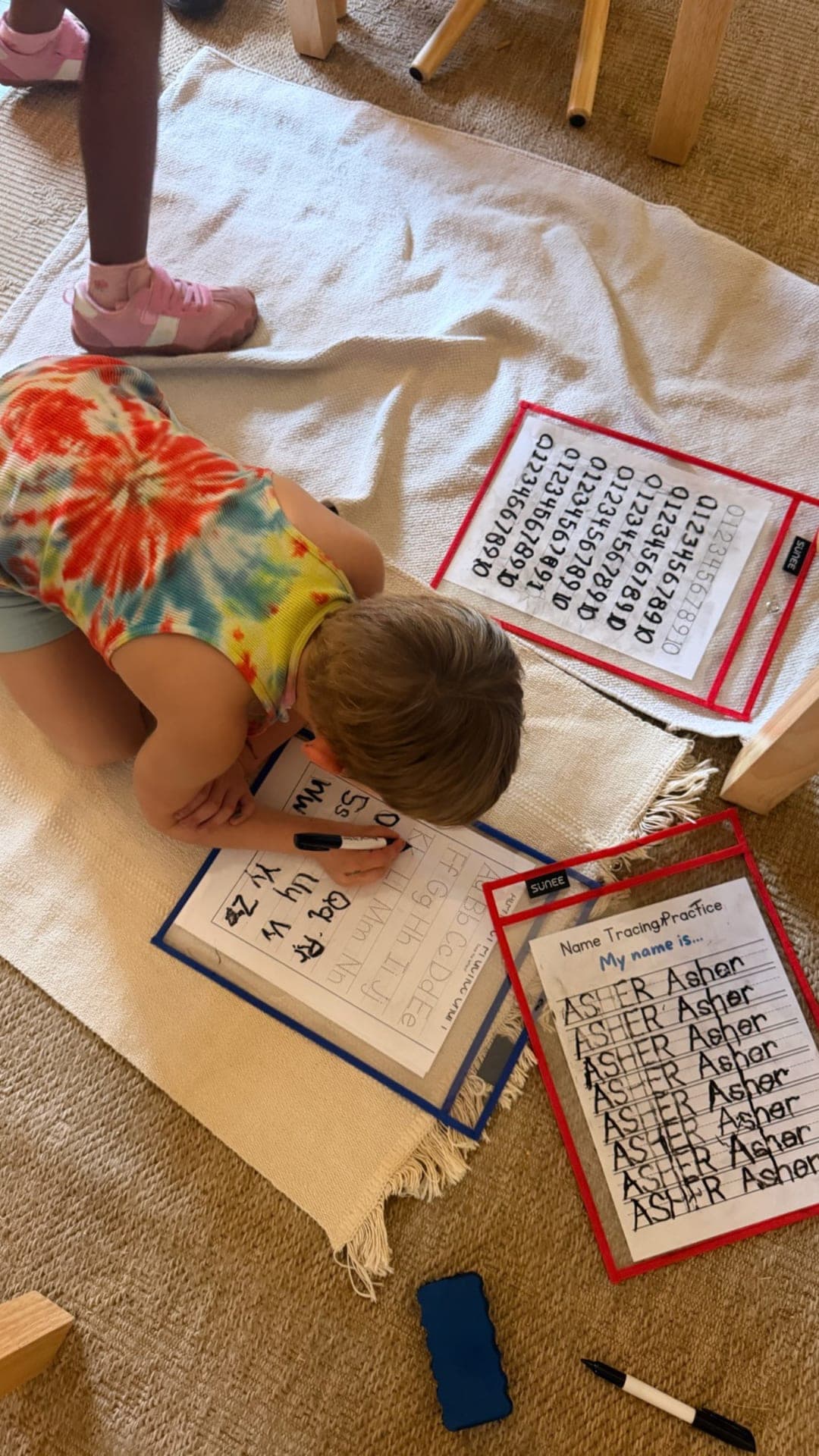Name tracing and alphabet practice on dry-erase sleeves
