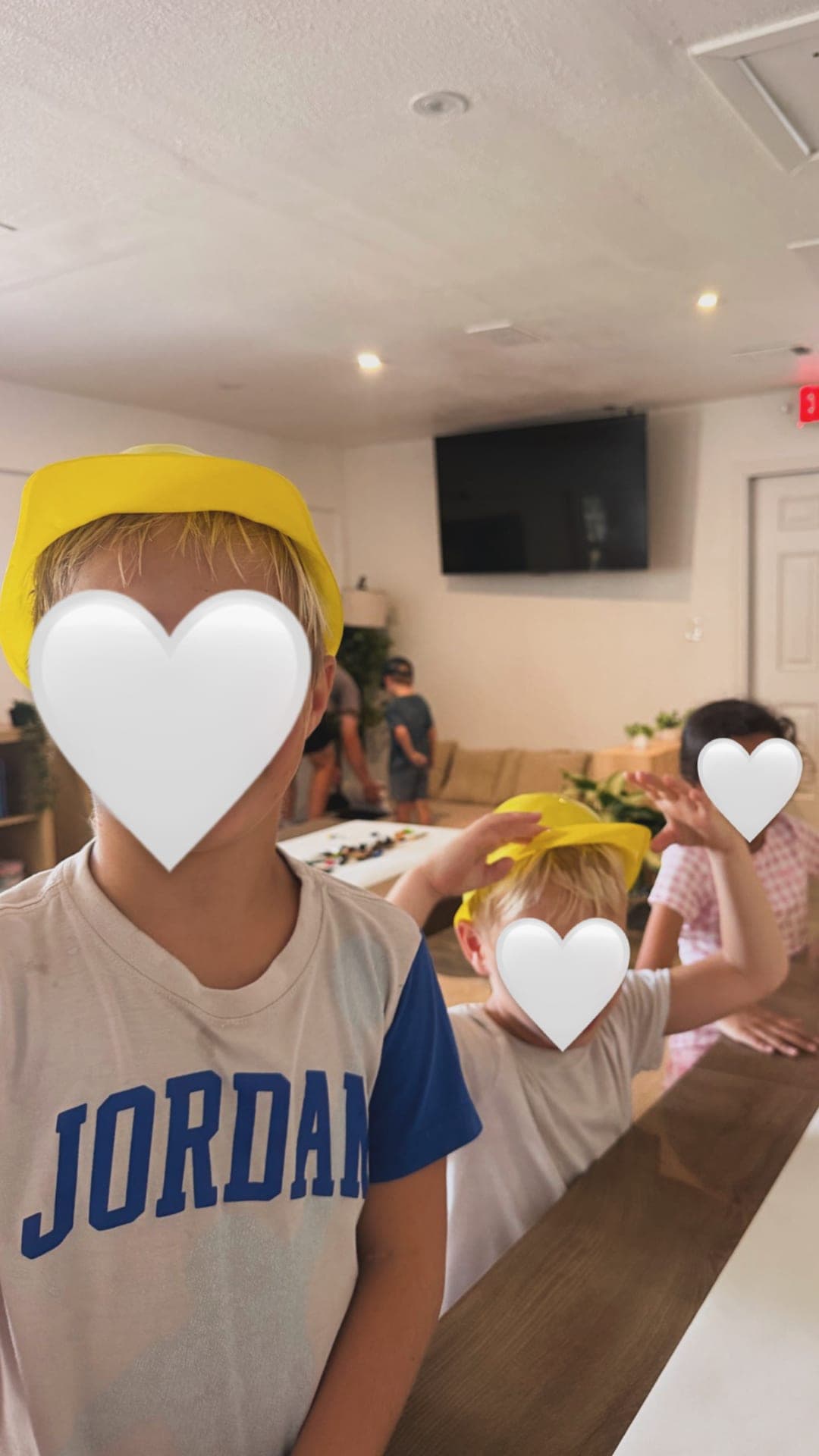 Construction Zone Friday — decorating hard hats with gems and paint markers