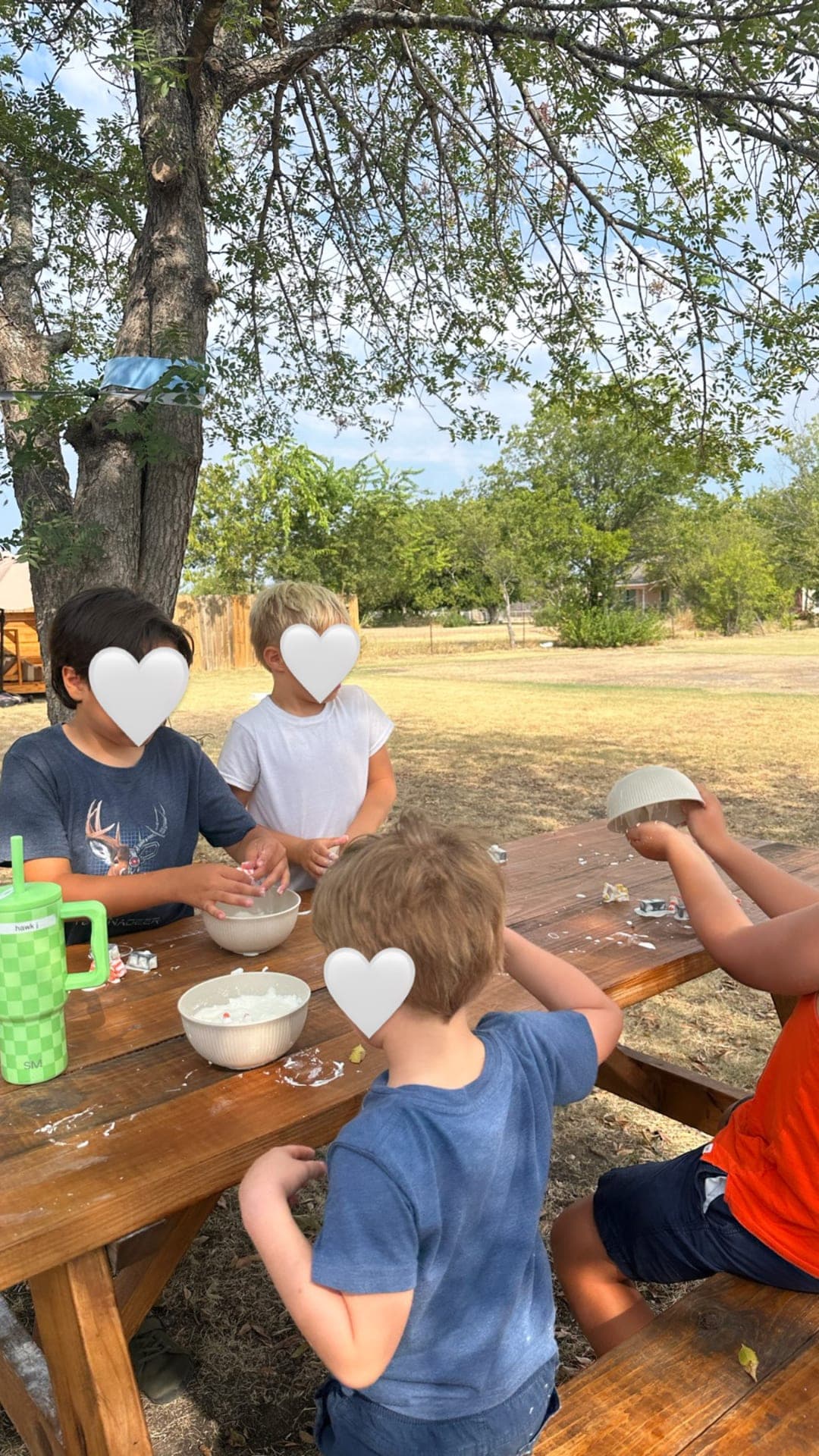 Sensory play with foam at the outdoor picnic table