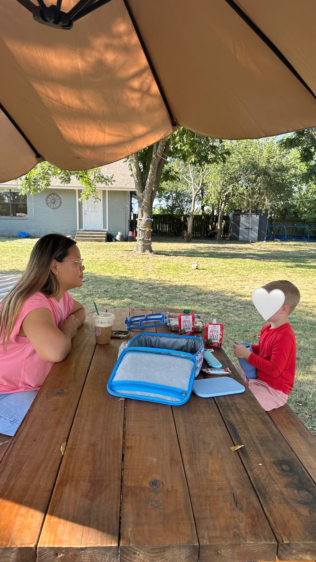 One-on-one lunch under the umbrella — slowing down and connecting