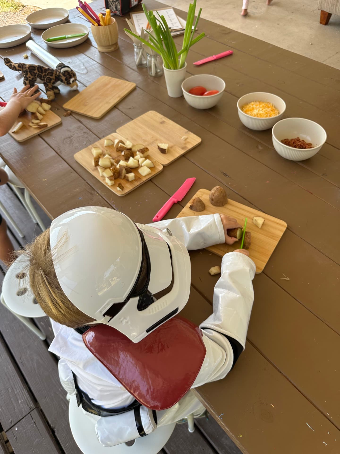 Stormtrooper in the kitchen — chopping potatoes in the coolest costume