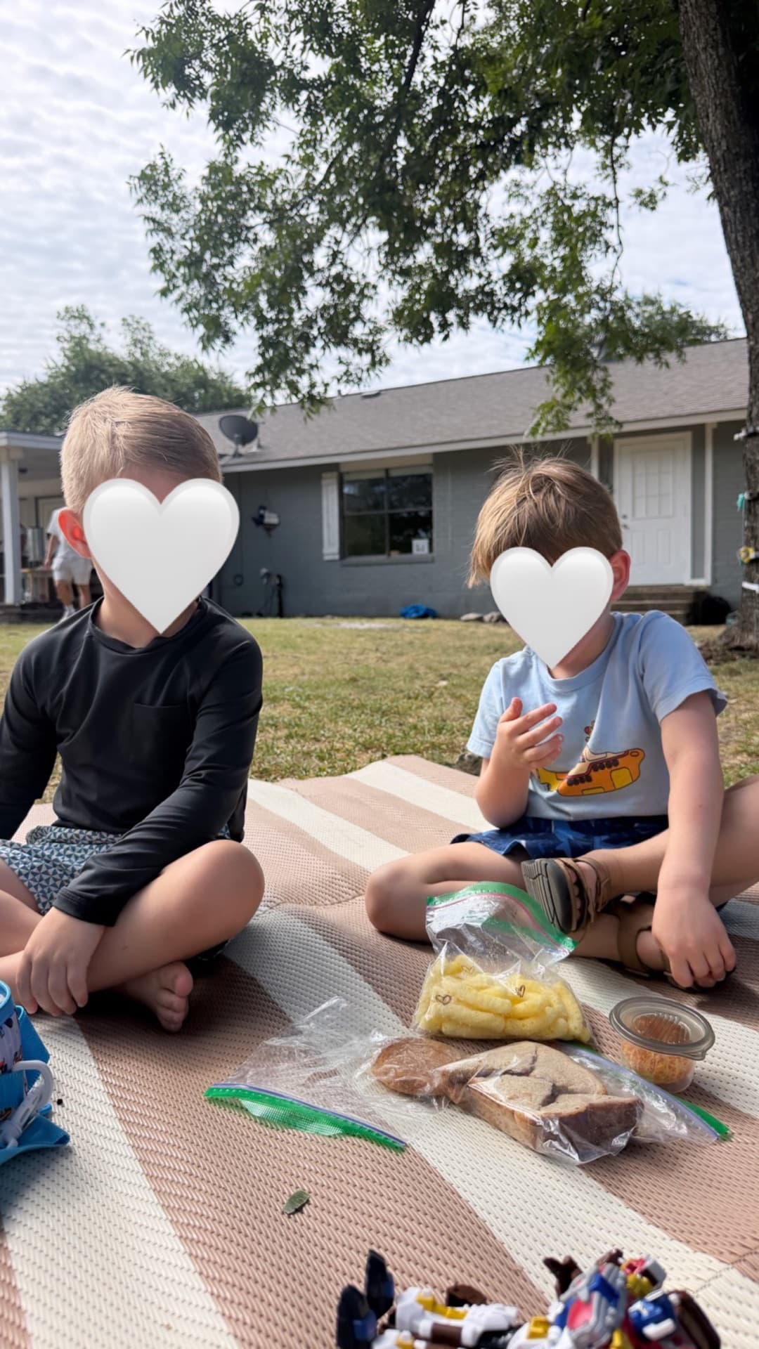 Side-by-side picnic lunch — new friendships, including welcoming Miss Joy